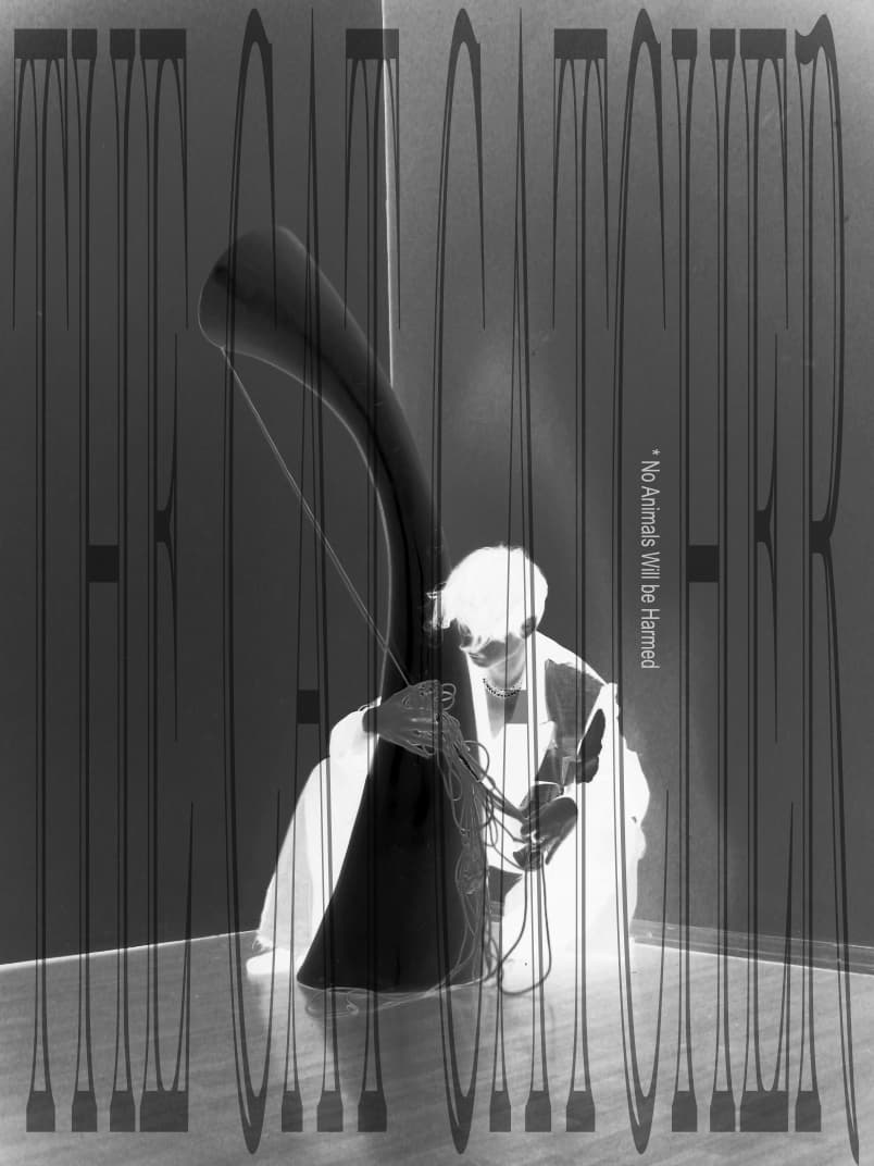 a human being is holding a mysterious object